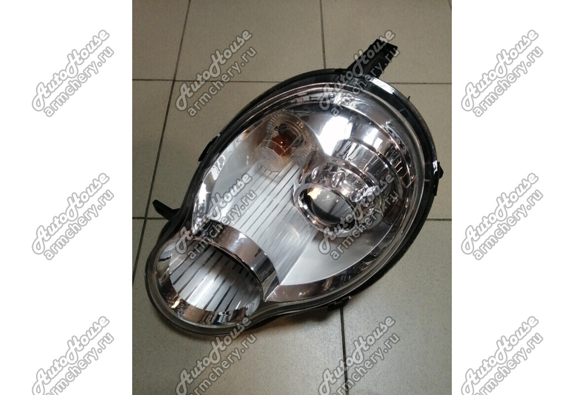 Фара левая (с корректором) Lifan Smily (320) [1.3 16V 5MT хетчбэк]