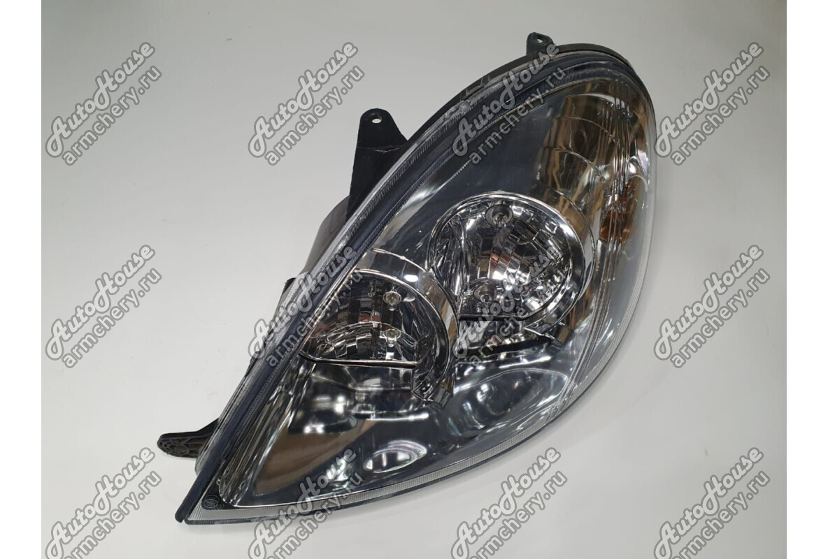 Фара левая (с корректором) Lifan Breez [1.6 16V 5MT седан]