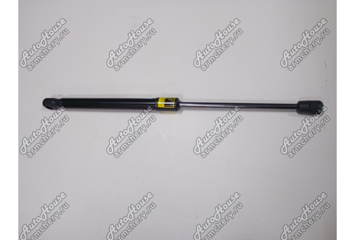 Амортизатор крышки багажника левый Chery Indis [1.3 16V 5AMT хетчбэк]