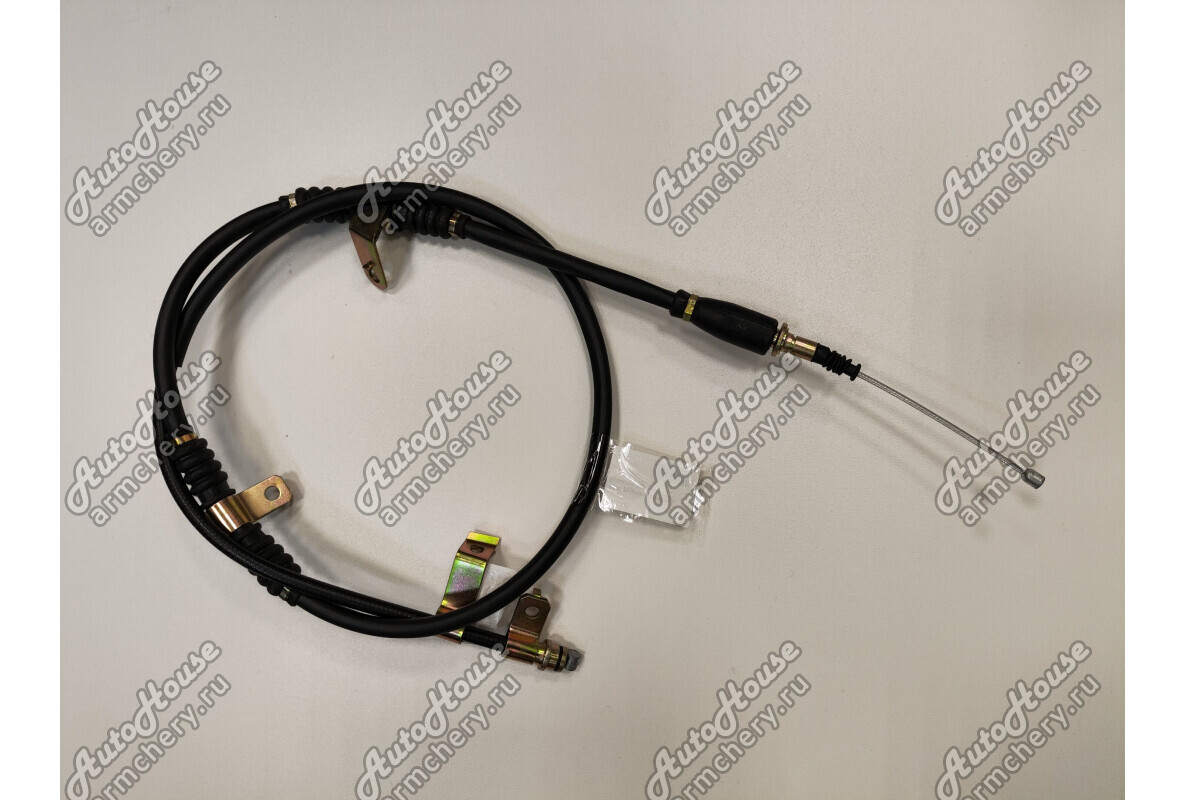 Трос ручного тормоза левый Brilliance M2 (2006-2010) [1.8 16V 5MT универсал]